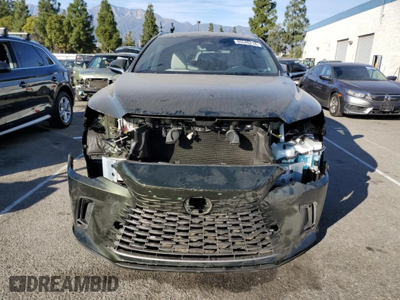2023 Lexus RX with VIN JTJCHMAA0P2001696, listed as a Copart auction lot 85546714 with 10,798 mi miles and Salvage Title. Bid and sale history available at carsss.com. Image 5.