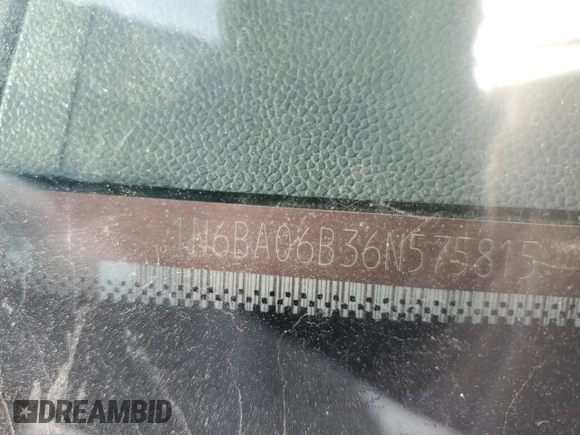 2006 Nissan Titan SE with VIN 1N6BA06B36N575815, listed as a Copart auction lot 79679104 with Not Provided miles and Salvage Title. Bid and sale history available at DreamBid. Image 12.