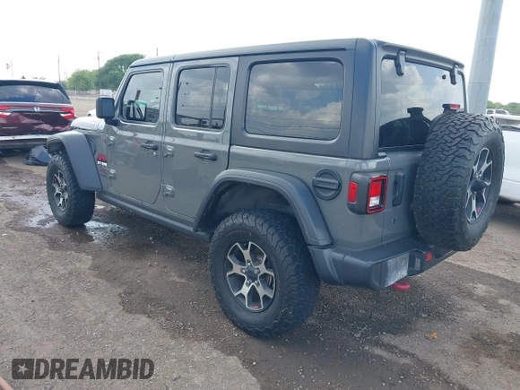 2020 Jeep Wrangler Unlimited Rubicon z VIN 1C4HJXFG7LW193665, wystawiony jako IAAI lot #41874930 z przebiegiem 58 884 mil mil oraz . Historia ofert i sprzedaży dostępna na DreamBid. Obrazek 3.