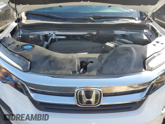 2021 Honda Pilot EX-L with VIN 5FNYF5H54MB045464, listed as a Copart auction lot 63412425 with 60,666 mi miles and Salvage title. Bid and sale history available at DreamBid. Image 12.