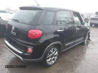 2014 FIAT 500L Trekking with VIN ZFBCFADH2EZ007684, listed as a IAAI auction lot 41952408 with 39,424 mi miles and . Bid and sale history available at DreamBid. Image 4.