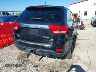 2013 Jeep Grand Cherokee Overland with VIN 1C4RJFCT1DC654653, listed as a IAAI auction lot 41826619 with 124,283 mi miles. Bid and sale history available at carsss.com. Image 4.