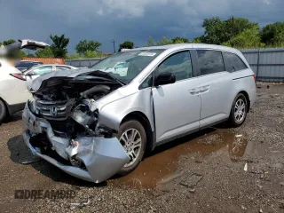 2013 Honda Odyssey EX-L with VIN 5FNRL5H66DB029191, listed as a Copart auction lot 61832575 with 155,547 mi miles and Salvage title. Bid and sale history available at DreamBid. Image 1.