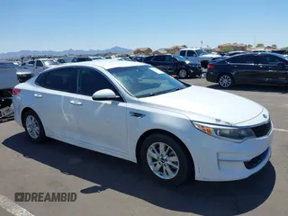 2016 Kia Optima LX z VIN 5XXGT4L33GG013871, wystawiony jako IAAI lot #42327728 z przebiegiem 138 573 mil mil oraz . Historia ofert i sprzedaży dostępna na DreamBid. Obrazek 1.