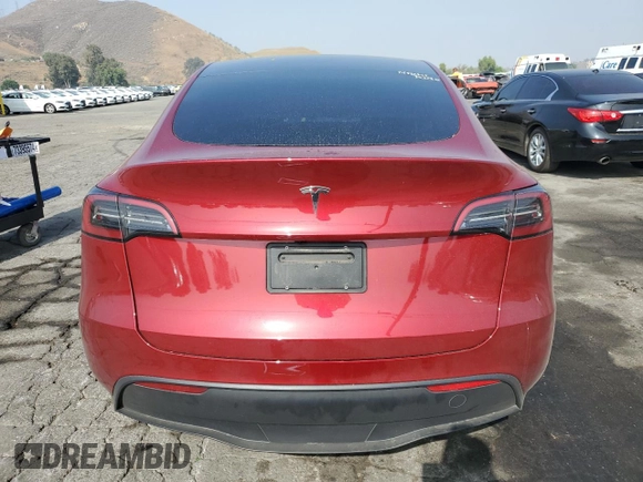 2024 Tesla Model Y с VIN 7SAYGDED3RF166676, выставлен на аукционе Copart как лот 60792165 с пробегом 22 445 миль миль и Списание • Salvage title. История ставок и продаж доступна на DreamBid. Изображение 6.