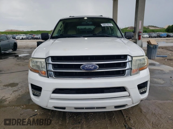 2015 Ford Expedition EL XLT with VIN 1FMJK1HTXFEF13525, listed as a Copart auction lot 68974014 with 69,489 mi miles and Salvage Title. Bid and sale history available at carsss.com. Image 5.