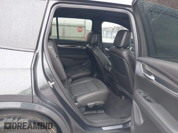 2023 Cadillac XT6 AWD Sport with VIN 1GYKPGRS0PZ177620, listed as a IAAI auction lot 42432423 with 24,070 mi miles and . Bid and sale history available at DreamBid. Image 8.