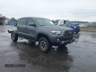 2020 Toyota Tacoma SR5 with VIN 3TMAZ5CN3LM124599, listed as a IAAI auction lot 41662626 with 99,879 mi miles and . Bid and sale history available at DreamBid. Image 1.