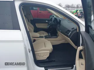 2021 Audi Q5 Premium Plus z VIN WA1BAAFY8M2077292, wystawiony jako IAAI lot #41663216 z przebiegiem 35 378 mil mil oraz . Historia ofert i sprzedaży dostępna na DreamBid. Obrazek 5.
