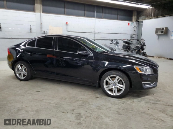 2015 Volvo S60 T5 Drive-E Platinum with VIN YV140MFM7F2348128, listed as a Copart auction lot 52698615 with 88,924 mi miles and Salvage Title. Bid and sale history available at carsss.com. Image 4.