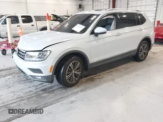 2019 Volkswagen Tiguan SE with VIN 3VV3B7AX9KM030028, listed as a IAAI auction lot 40445099 with 85,400 mi miles and . Bid and sale history available at DreamBid. Image 2.
