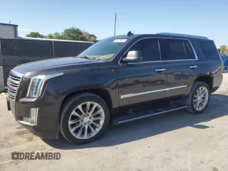 2018 Cadillac Escalade Platinum z VIN 1GYS4DKJ4JR187437, wystawiony jako Copart lot #52129915 z przebiegiem 70 128 mil mil oraz Czysty tytuł • Clean title. Historia ofert i sprzedaży dostępna na DreamBid. Obrazek 1.
