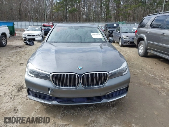 2017 BMW 7 Series 740i with VIN WBA7E2C54HG740170, listed as a IAAI auction lot 41432578 with 110,893 mi miles and . Bid and sale history available at DreamBid. Image 12.