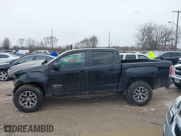 2021 GMC Canyon 4WD AT4 w/Leather with VIN 1GTG6FEN4M1103068, listed as a IAAI auction lot 41673275 with 62,254 mi miles. Bid and sale history available at carsss.com. Image 14.