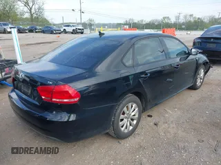 2015 Volkswagen Passat 1.8T Limited Edition with VIN 1VWAT7A36FC051441, listed as a IAAI auction lot 42031494 with 193,354 mi miles. Bid and sale history available at carsss.com. Image 4.