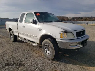 1998 Ford F-250 with VIN 1FTPX28L4WKA41149, listed as a Copart auction lot 84369654 with 430,187 mi miles and Salvage title. Bid and sale history available at DreamBid. Image 4.