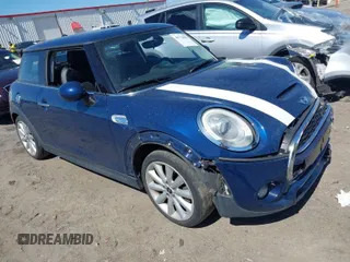 2014 MINI Hardtop S with VIN WMWXM7C59ET986912, listed as a IAAI auction lot 41776053 with 65,591 mi miles and . Bid and sale history available at DreamBid. Image 1.