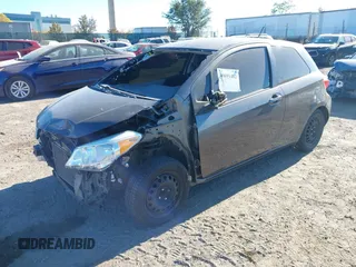 2013 Toyota Yaris L with VIN JTDJTUD33DD550976, listed as a IAAI auction lot 40691482 with 149,614 mi miles. Bid and sale history available at carsss.com. Image 2.