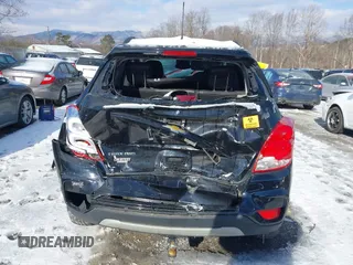 2022 Chevrolet Trax LT with VIN KL7CJPSM2NB567855, listed as a IAAI auction lot 41242877 with 87,001 mi miles. Bid and sale history available at carsss.com. Image 16.
