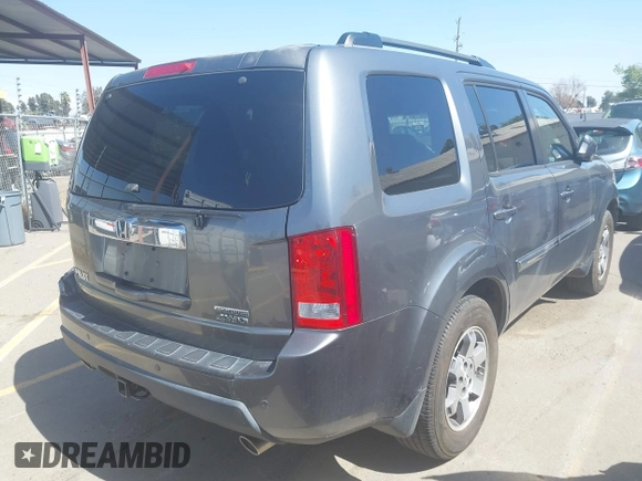 2011 Honda Pilot Touring with VIN 5FNYF4H96BB083532, listed as a IAAI auction lot 41926177 with 100,815 mi miles. Bid and sale history available at carsss.com. Image 4.