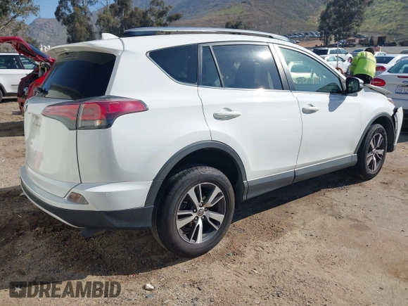 2017 Toyota RAV4 XLE with VIN JTMWFREV9HJ128521, listed as a IAAI auction lot 41658054 with 106,788 mi miles and . Bid and sale history available at DreamBid. Image 4.