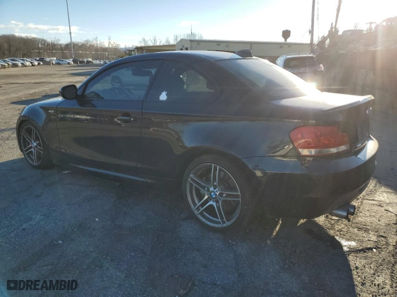 2013 BMW 1 Series 135i with VIN WBAUC9C54DVM13873, listed as a Copart auction lot 82657734 with 78,021 mi miles and Salvage Title. Bid and sale history available at carsss.com. Image 2.