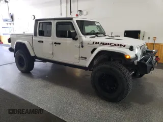 2020 Jeep Gladiator Rubicon with VIN 1C6JJTBG8LL121687, listed as a Copart auction lot 66404935 with 52,884 mi miles and Clean title. Bid and sale history available at DreamBid. Image 4.