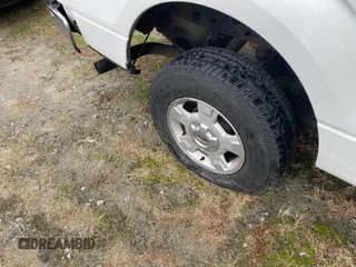 2014 Ford F-150 XL with VIN 1FTNF1CF7EKE17816, listed as a IAAI auction lot 41527762 with 196,338 mi miles and . Bid and sale history available at DreamBid. Image 6.