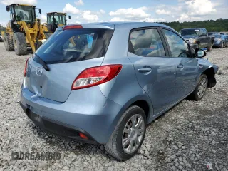 2013 Mazda 2 Sport with VIN JM1DE1KY5D0162904, listed as a Copart auction lot 57712794 with 138,718 mi miles and Salvage Title. Bid and sale history available at carsss.com. Image 3.