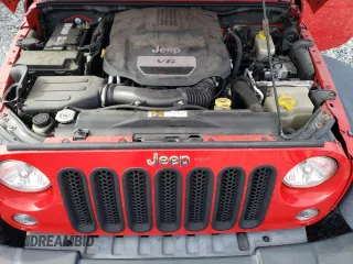 2015 Jeep Wrangler Unlimited Willys Wheeler with VIN 1C4BJWDG2FL542045, listed as a Copart auction lot 52903465 with 86,205 mi miles and Clean Title. Bid and sale history available at DreamBid. Image 11.