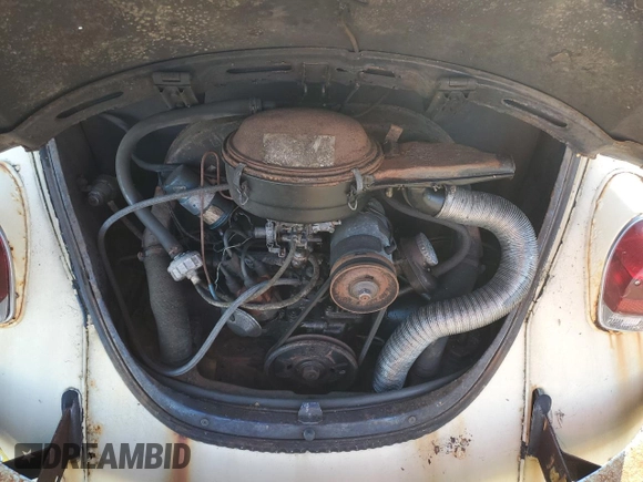 1969 Volkswagen Beetle with VIN 1190494912, listed as a Copart auction lot 75495264 with 67,827 mi miles and Salvage Title. Bid and sale history available at DreamBid. Image 11.