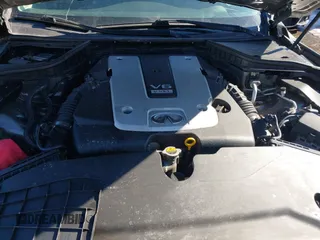 2015 Infiniti Q50 with VIN JN1BV7AR4FM407078, listed as a IAAI auction lot 41680093 with 122,666 mi miles. Bid and sale history available at carsss.com. Image 10.