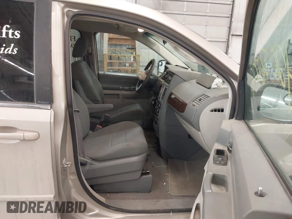 2009 Chrysler Town & Country LX with VIN 2A8HR44E79R683493, listed as a IAAI auction lot 42056729 with 147,227 mi miles. Bid and sale history available at carsss.com. Image 5.