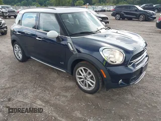2016 MINI Countryman S with VIN WMWZC5C51GWU04173, listed as a IAAI auction lot 42620287 with 96,392 mi miles and . Bid and sale history available at DreamBid. Image 1.