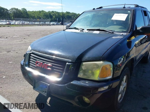 2005 GMC Envoy SLE with VIN 1GKDS13S452208252, listed as a IAAI auction lot 42357457 with 197,419 mi miles and . Bid and sale history available at DreamBid. Image 12.