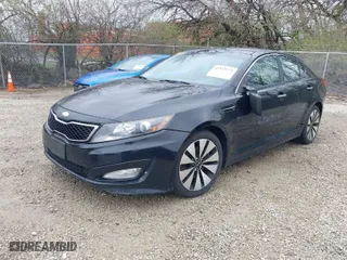2013 Kia Optima SX with VIN 5XXGR4A61DG184092, listed as a IAAI auction lot 41923574 with 150,092 mi miles. Bid and sale history available at carsss.com. Image 2.