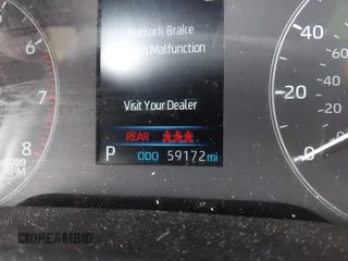 2023 Toyota Corolla Cross Hybrid S with VIN 7MUFBABG0PV004809, listed as a IAAI auction lot 41489550 with 59,172 mi miles and . Bid and sale history available at DreamBid. Image 7.