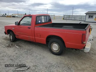 1988 GMC Sonoma with VIN 1GTBS14E2J2539806, listed as a Copart auction lot 71105184 with 141,085 mi miles and Salvage Title. Bid and sale history available at DreamBid. Image 2.