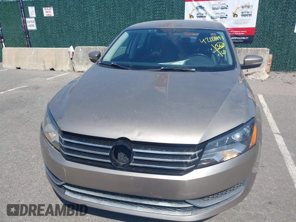 2015 Volkswagen Passat 1.8T Limited Edition with VIN 1VWAT7A34FC032404, listed as a IAAI auction lot 42126991 with 64,820 mi miles. Bid and sale history available at carsss.com. Image 6.