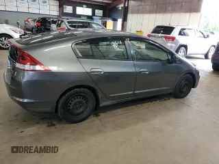 2013 Honda Insight z VIN JHMZE2H36DS002170, wystawiony jako Copart lot #56276445 z przebiegiem 197 871 mil mil oraz Czysty tytuł • Clean title. Historia ofert i sprzedaży dostępna na DreamBid. Obrazek 3.