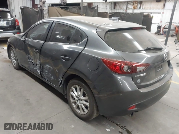 2015 Mazda 3 i Touring with VIN JM1BM1L75F1259985, listed as a IAAI auction lot 41067447 with 104,865 mi miles and . Bid and sale history available at carsss.com. Image 3.