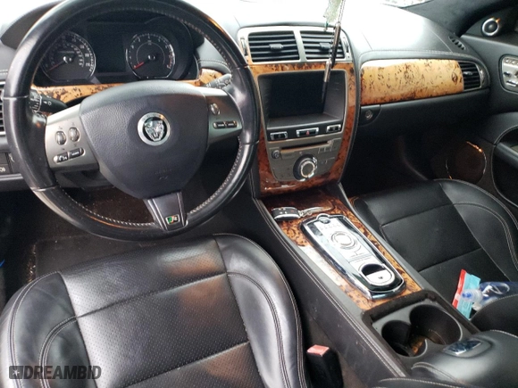 2011 Jaguar XK with VIN SAJWA4DC7BMB40355, listed as a Copart auction lot 88007985 with 0 mi miles and Salvage Title. Bid and sale history available at carsss.com. Image 8.