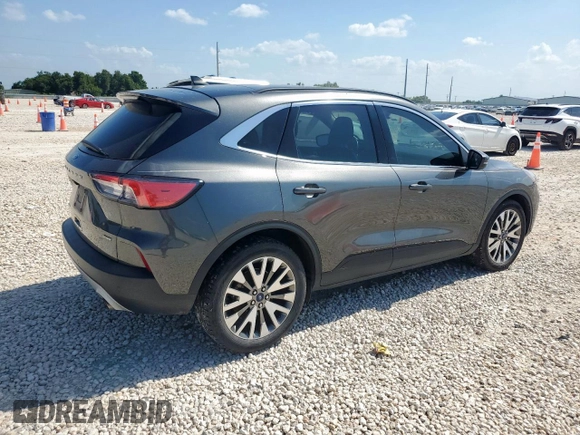 2020 Ford Escape Titanium Hybrid z VIN 1FMCU0DZ1LUC38345, wystawiony jako Copart lot #59628985 z przebiegiem 86 917 mil mil oraz Szkoda całkowita • Salvage title. Historia ofert i sprzedaży dostępna na DreamBid. Obrazek 3.