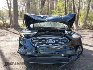2022 Ford Edge Titanium with VIN 2FMPK4K95NBB06151, listed as a IAAI auction lot 41932545 with 57,762 mi miles and . Bid and sale history available at DreamBid. Image 6.