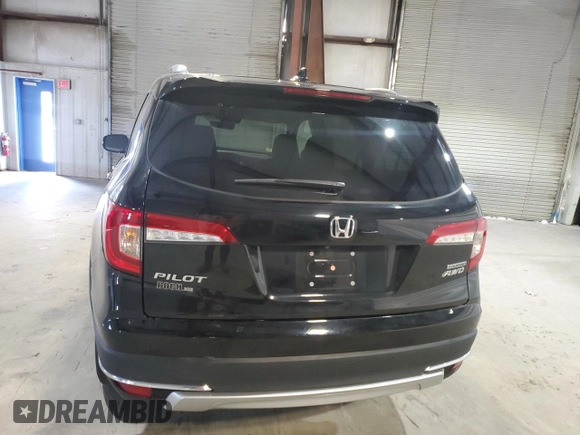 2021 Honda Pilot Touring 7-Passenger z VIN 5FNYF6H62MB079918, wystawiony jako Copart lot #53272865 z przebiegiem 29 581 mil mil oraz Szkoda całkowita • Salvage title. Historia ofert i sprzedaży dostępna na DreamBid. Obrazek 6.