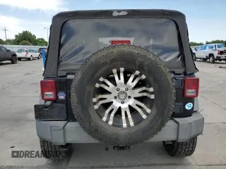 2014 Jeep Wrangler Sport with VIN 1C4AJWAG8EL159953, listed as a Copart auction lot 61175035 with 137,480 mi miles and Salvage title. Bid and sale history available at DreamBid. Image 6.