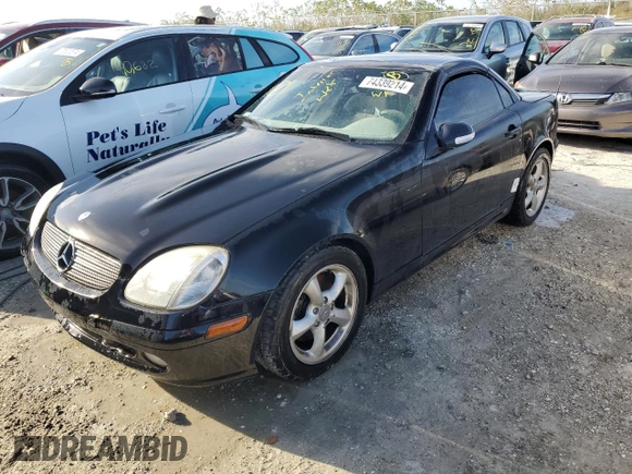2001 Mercedes-Benz SLK-Class with VIN WDBKK65F51F217396, listed as a Copart auction lot 74339214 with 56,281 mi miles and Salvage Title. Bid and sale history available at carsss.com. Image 1.