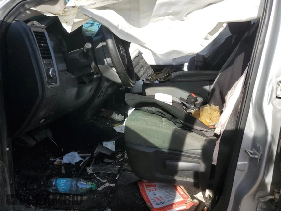 2014 Ram 1500 Express z VIN 1C6RR6FT3ES135249, wystawiony jako Copart lot #49354715 z przebiegiem Nie podano mil oraz Szkoda całkowita • Salvage title. Historia ofert i sprzedaży dostępna na DreamBid. Obrazek 7.