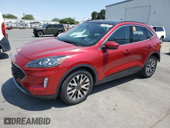 2020 Ford Escape Titanium with VIN 1FMCU9J98LUA58109, listed as a Copart auction lot 59397735 with 31,334 mi miles and Salvage title. Bid and sale history available at DreamBid. Image 1.