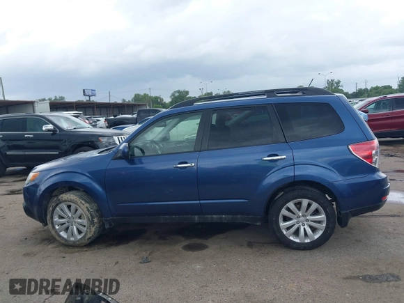 2012 Subaru Forester X Premium z VIN JF2SHBCC7CH431025, wystawiony jako IAAI lot #42144648 z przebiegiem 114 336 mil mil oraz . Historia ofert i sprzedaży dostępna na DreamBid. Obrazek 14.